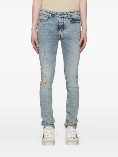 Ksubi distressed logo-patch jeans