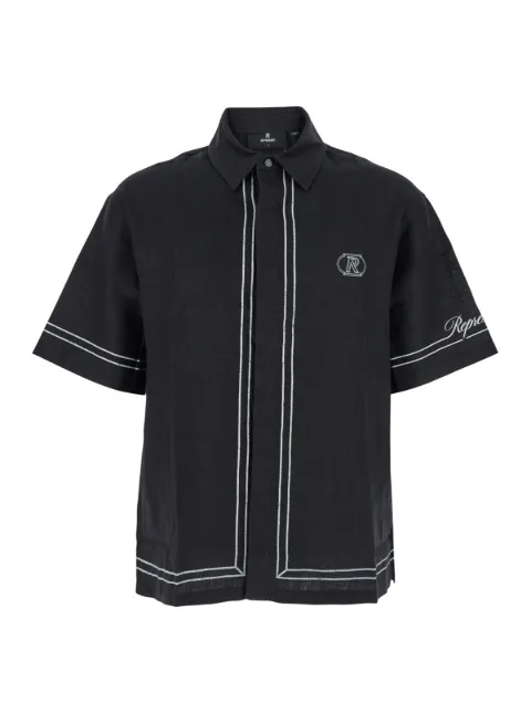 Represent قميص 'جيت' بأطراف مطرزة