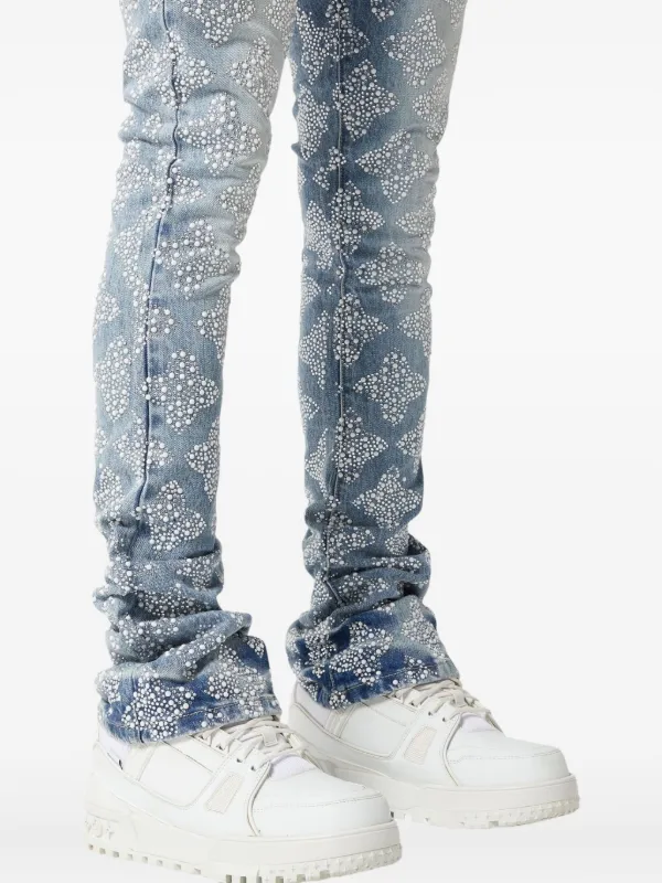 low-rise "Black Wash Blowout" slim jeans