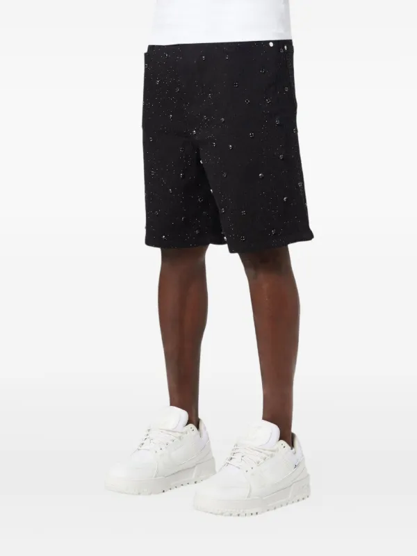 low-rise "Black Wash Blowout" slim jeans
