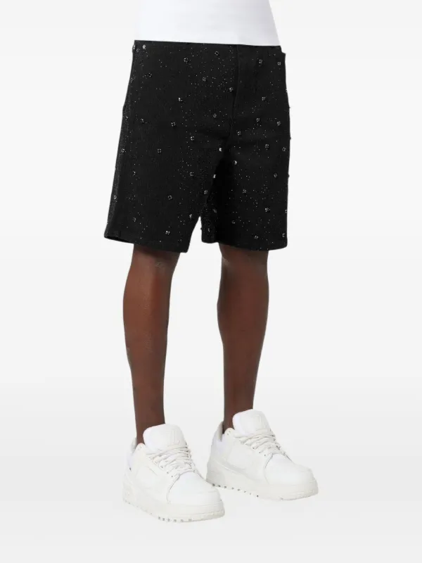 low-rise "Black Wash Blowout" slim jeans
