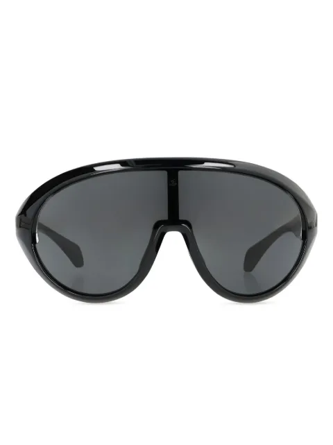 Moncler lentes de sol con armazón ovalada