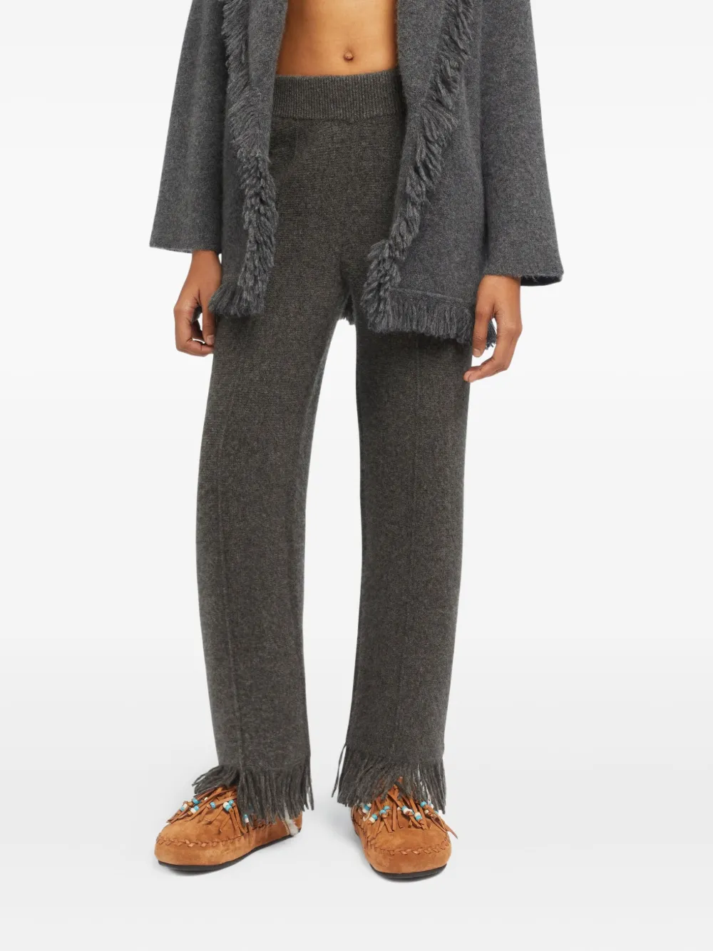 Alanui fringed knitted trousers Grijs