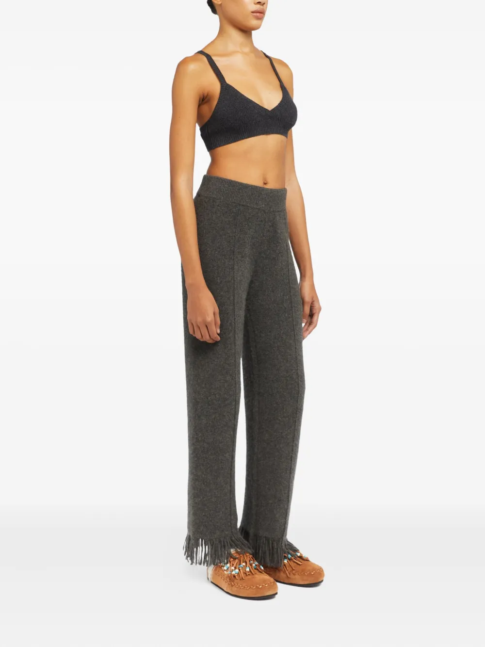 Alanui fringed knitted trousers Grijs