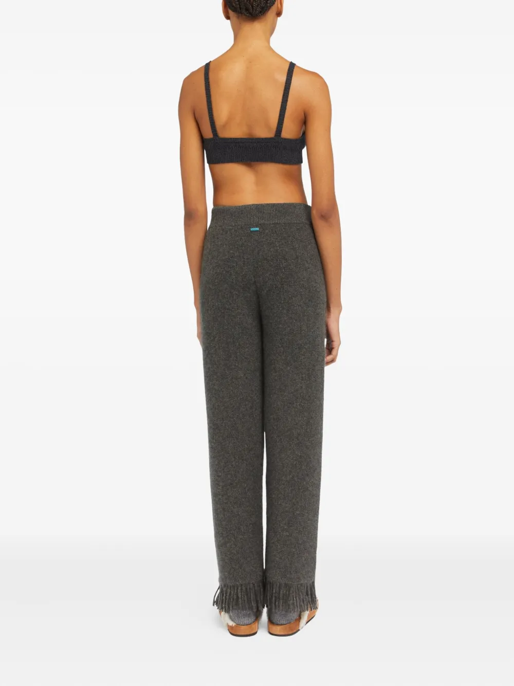 Alanui fringed knitted trousers Grijs