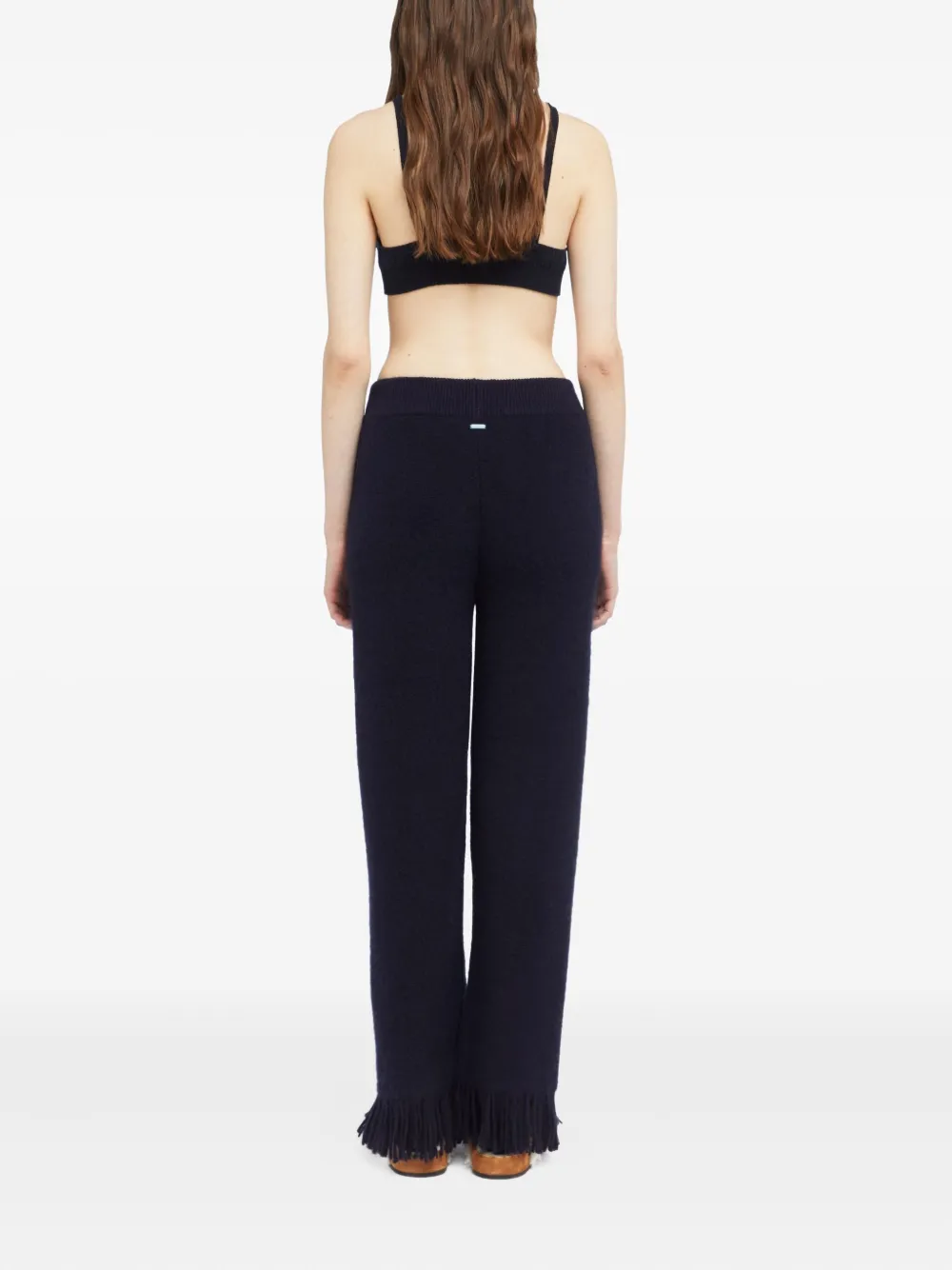 Alanui fringe-detail trousers Blauw