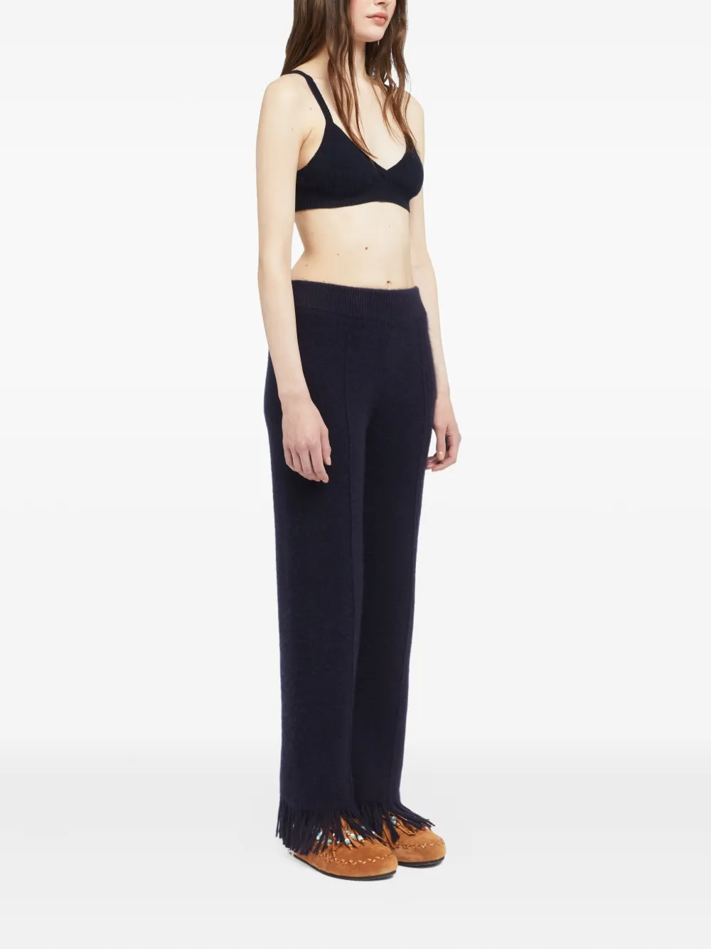 Alanui fringe-detail trousers Blauw