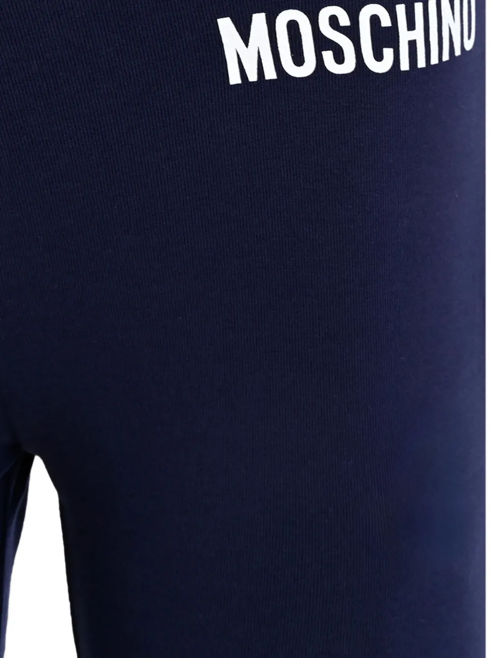 Moschino Kids logo-waistband flared trousers Blauw