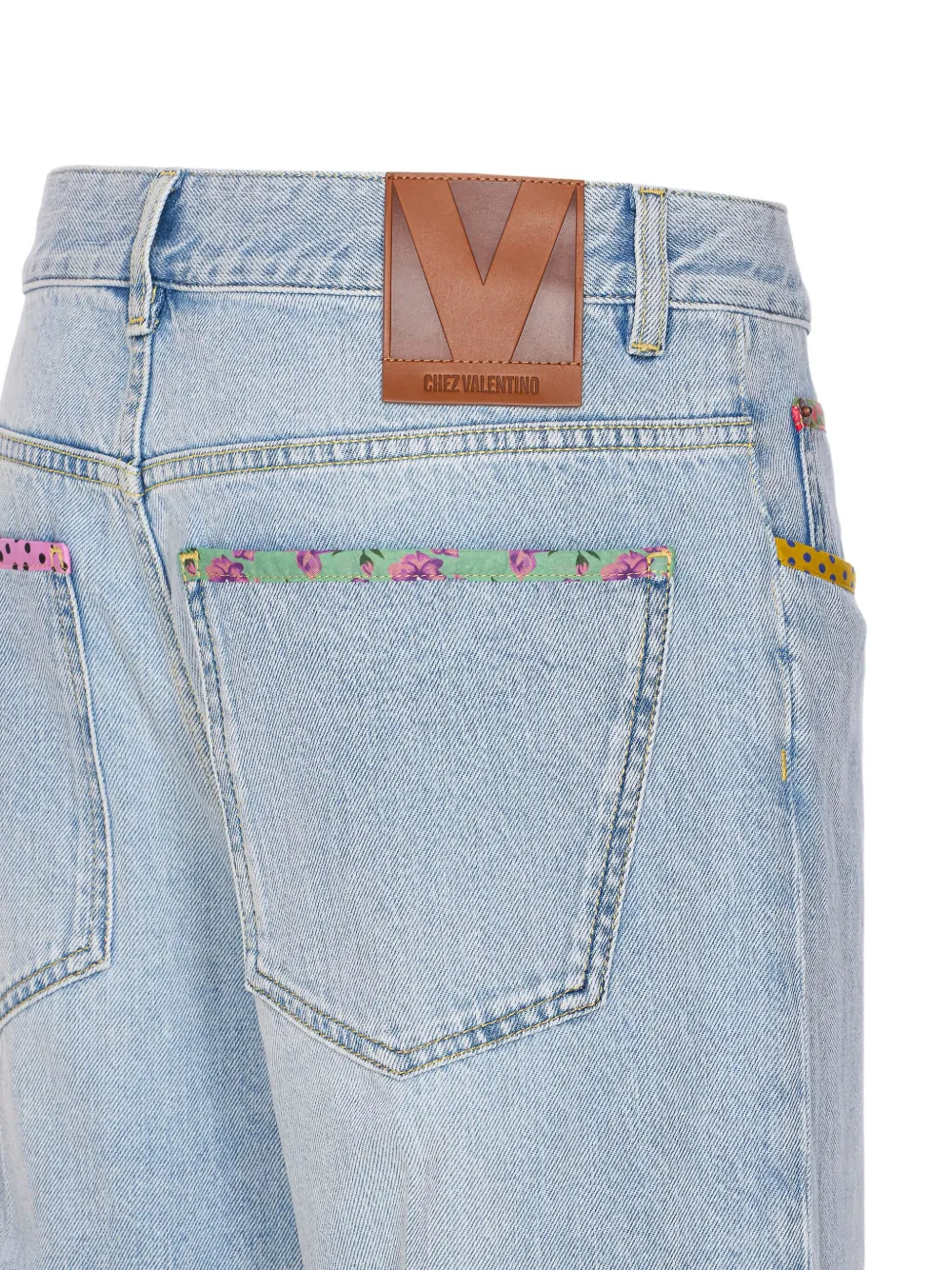 Valentino Garavani floral-hem embroidered jeans Blauw