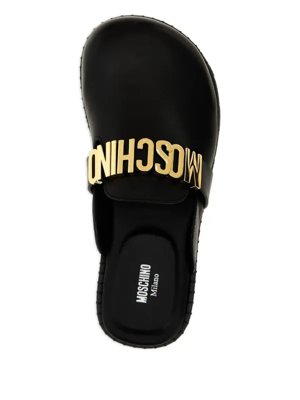 Moschino logo-plaque Leather Mules | Black | FARFETCH