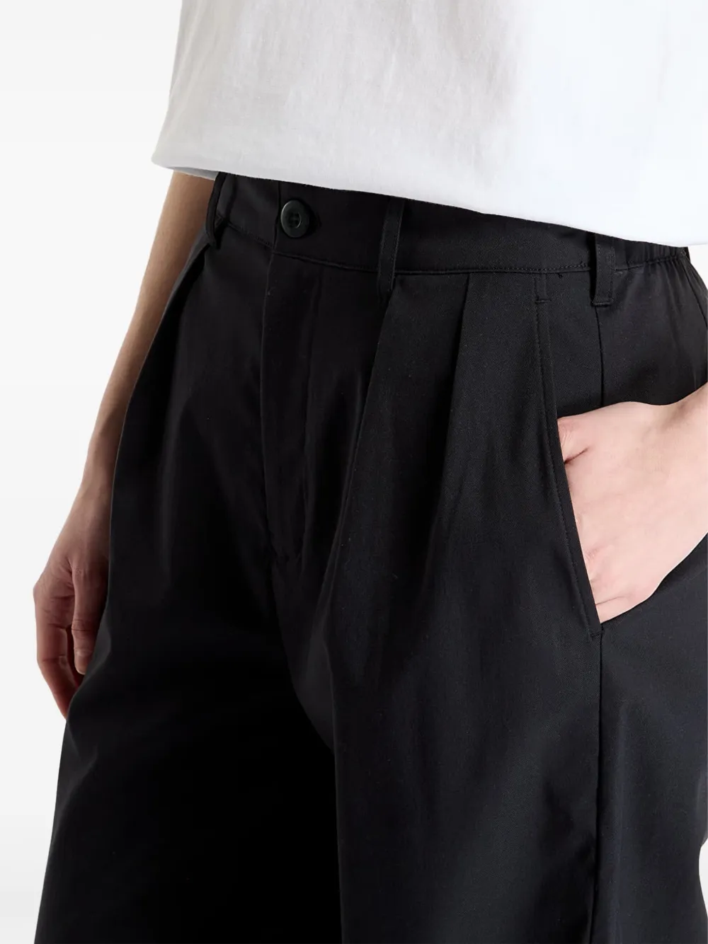 New Balance Boylston geplooide broek Zwart