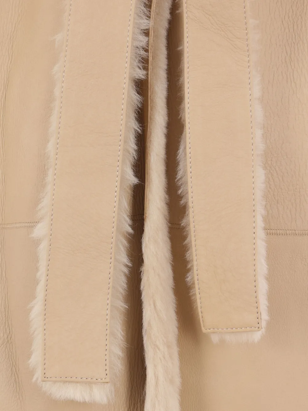 Arma belted shearling coat Beige