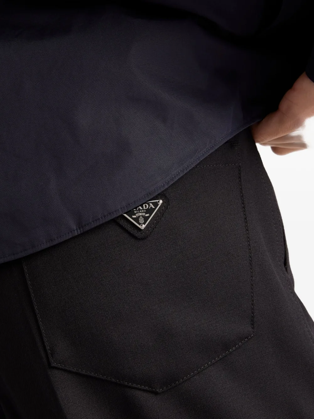 Prada triangle-logo wool trousers Zwart