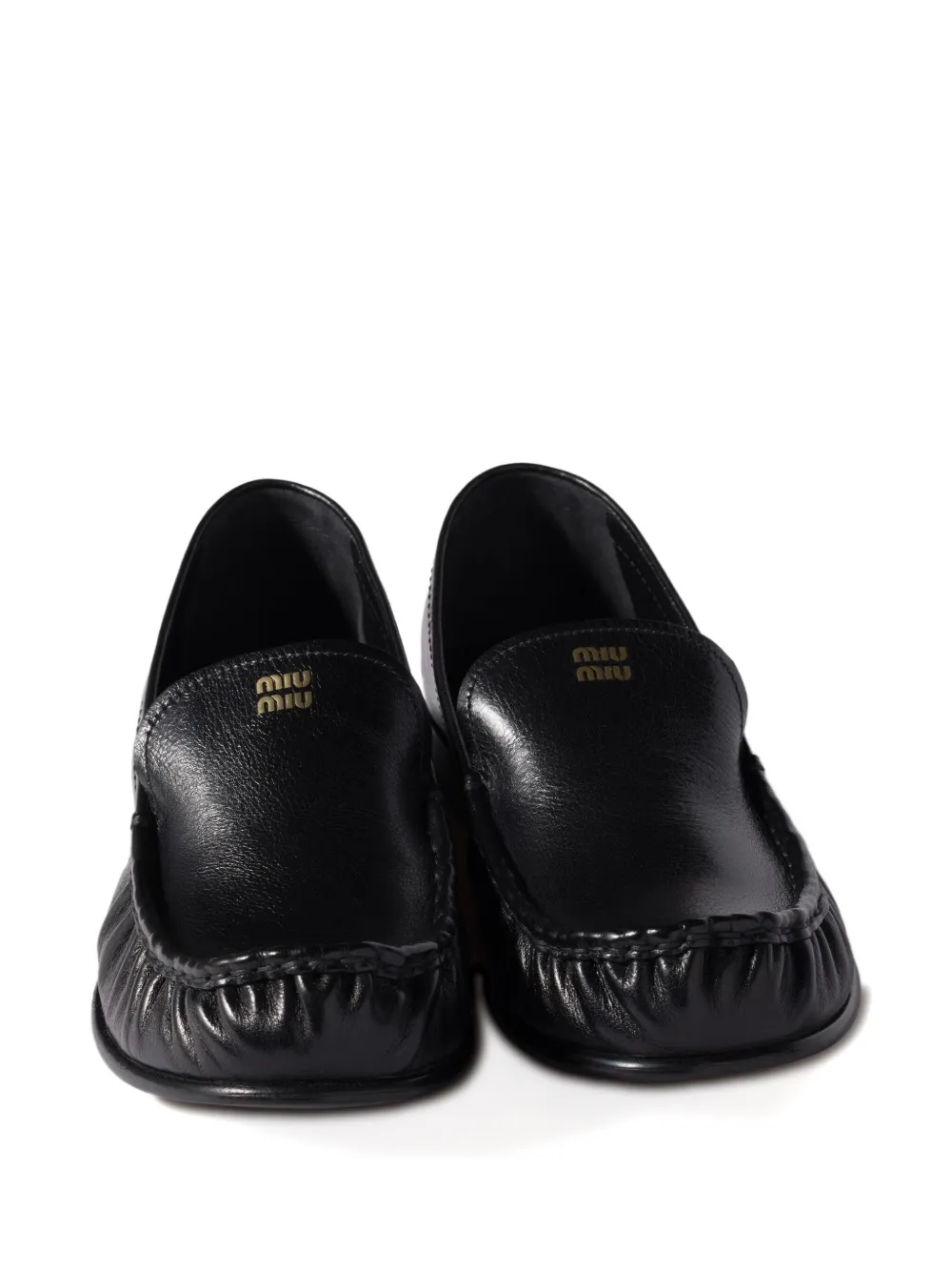 Miu embossed-logo loafers Zwart