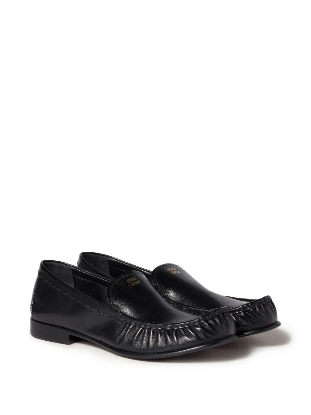Miu embossed-logo loafers Zwart