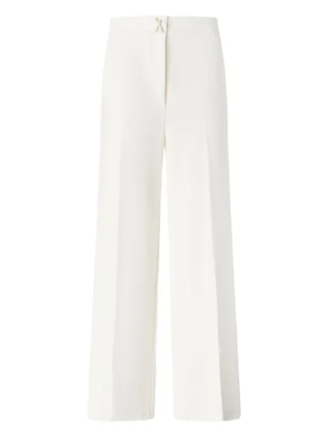 Genny cross-detail trousers