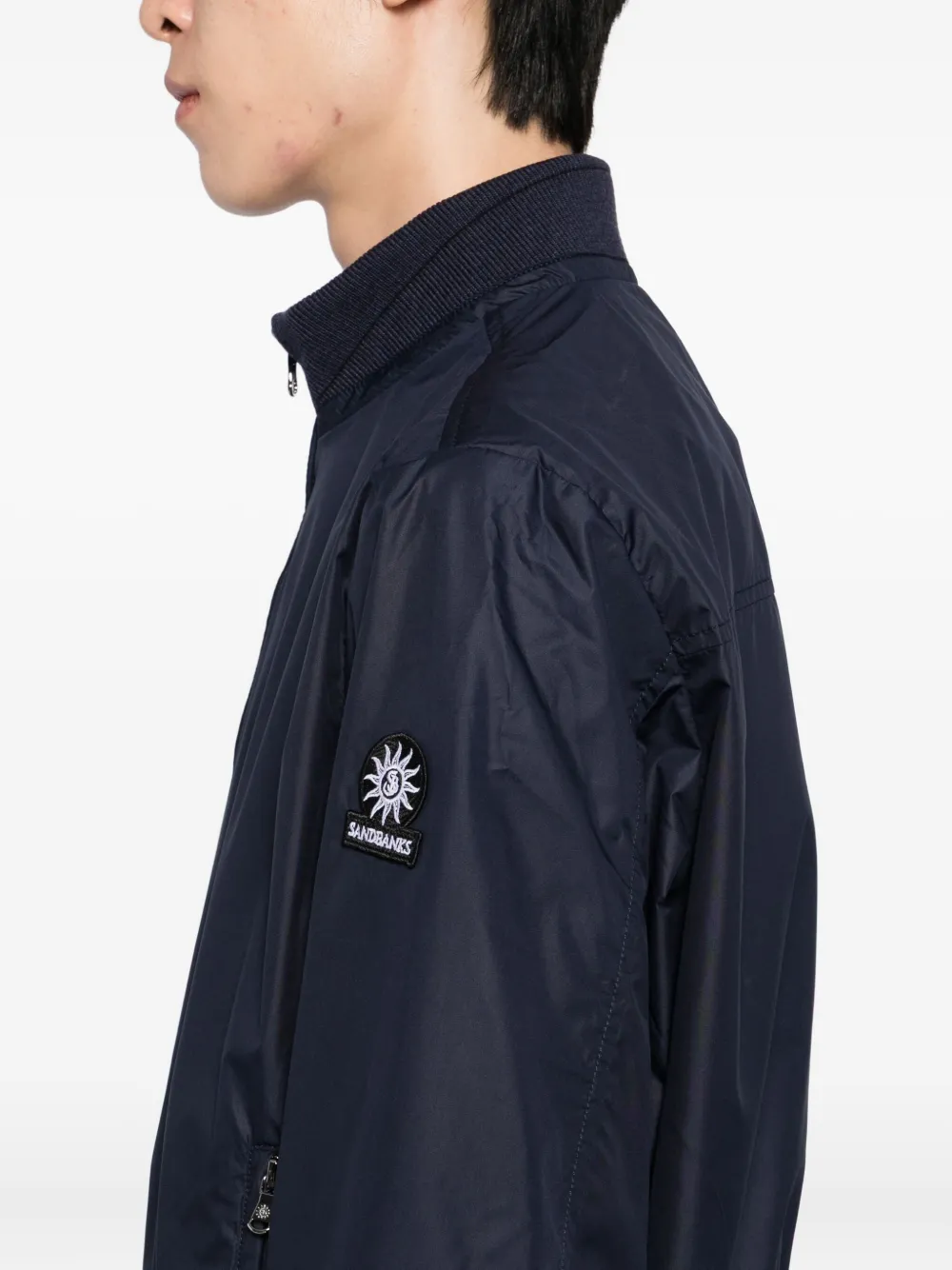Sandbanks Reversible Logo-patch Jacket In Blue