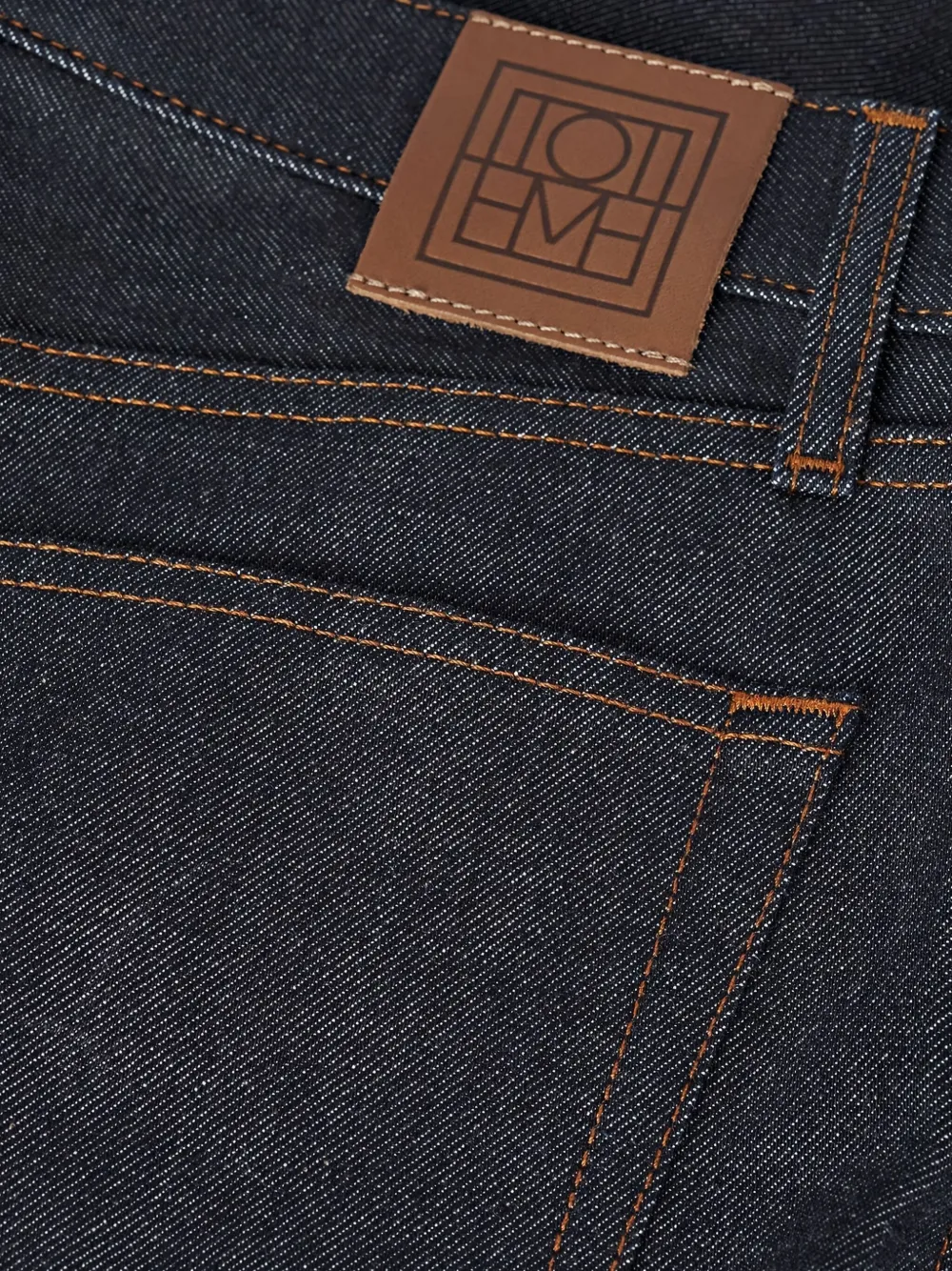 TOTEME cotton raw-denim jeans Zwart