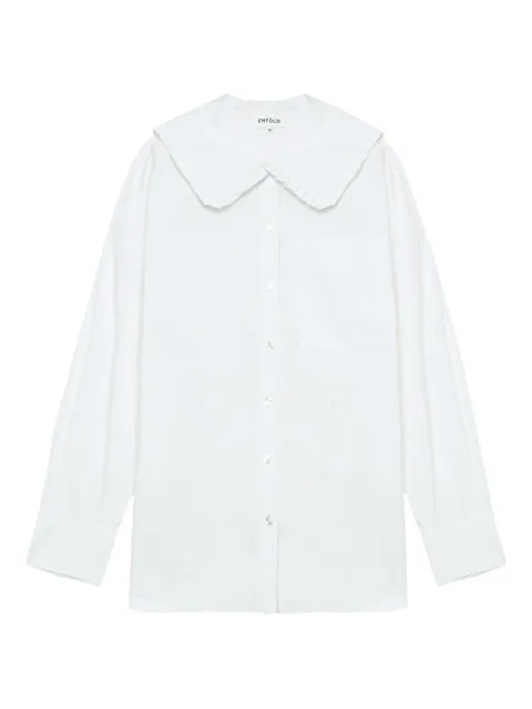 Enföld camisa con volantes en el cuello