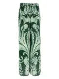 F.R.S For Restless Sleepers Arche tropical-print trousers - Green