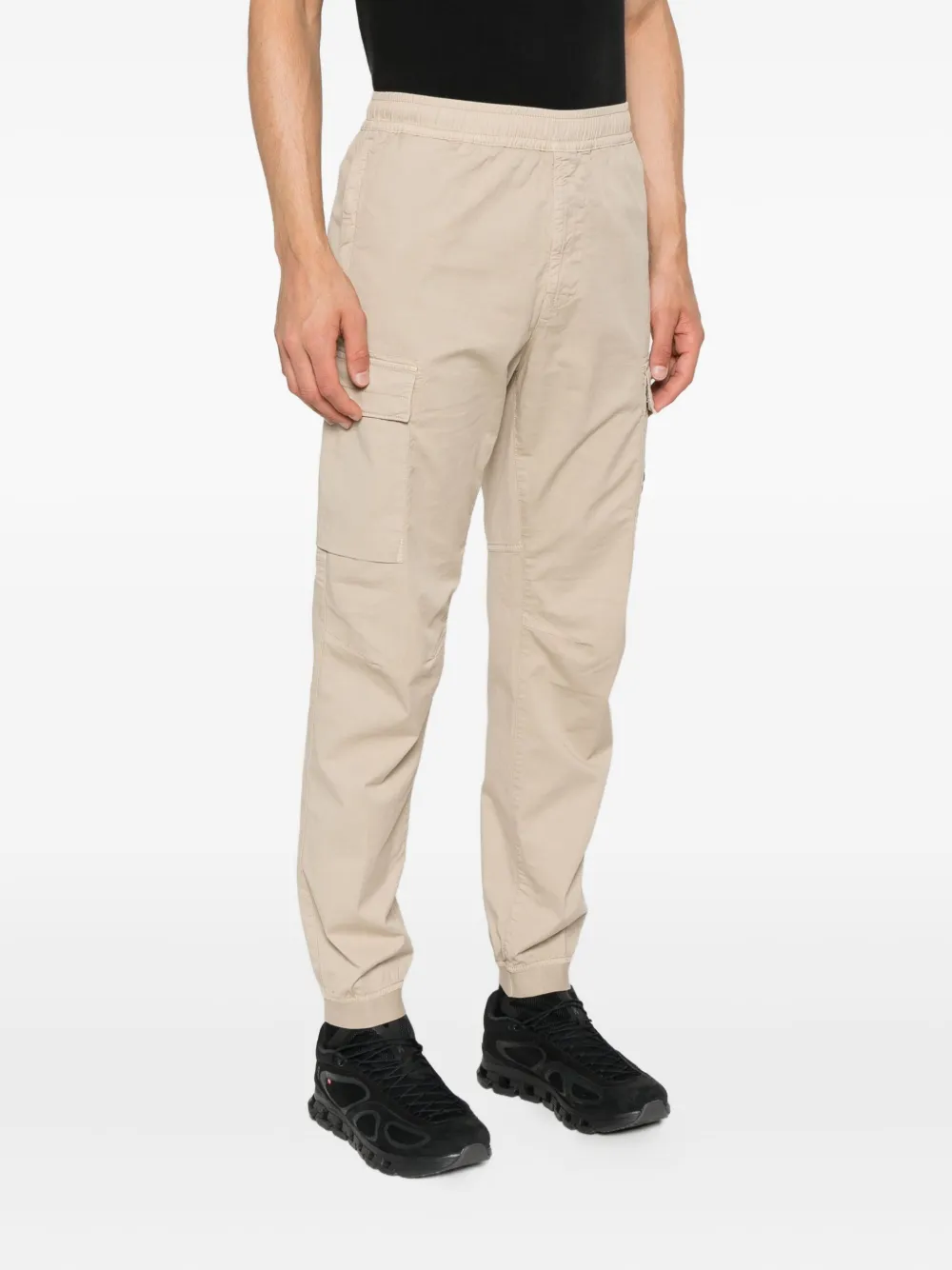 Stone Island Broek met cargo zak en manchetten Beige