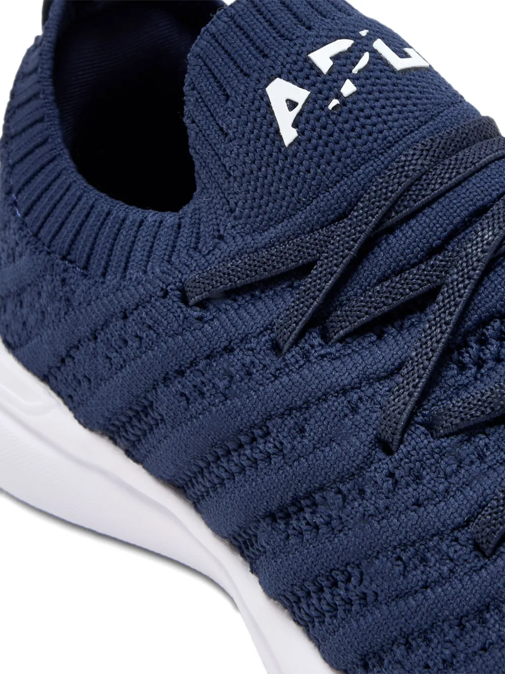 APL: ATHLETIC PROPULSION LABS textured-knit lace-up sneakers Blue