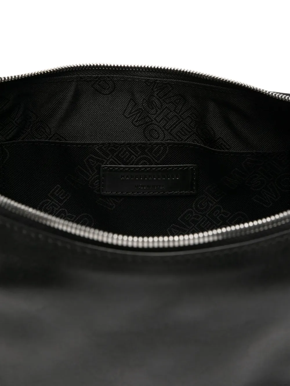 Marge Sherwood medium debossed-logo shoulder bag Zwart