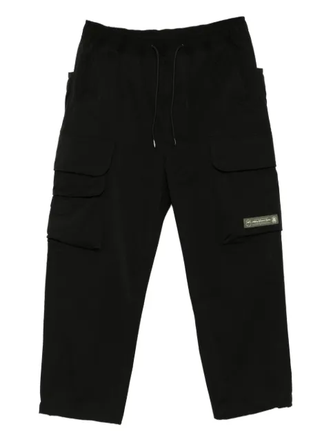 FINGERCROXX slogan-patch trosuers