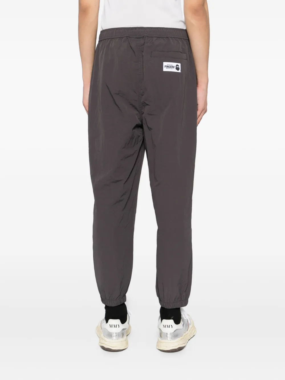 Fingercroxx Logo-patch Trousers In Black
