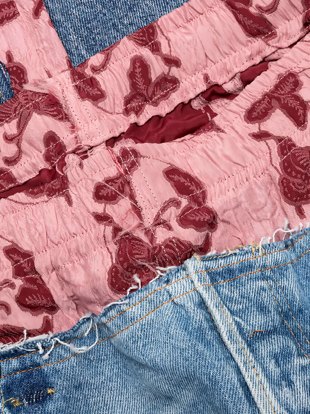 Needles floral-panel distressed trousers Blauw