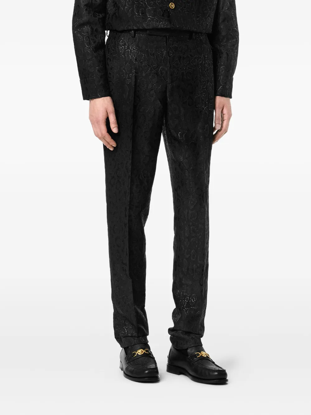 Versace Jacquard Leopard Trousers In Black
