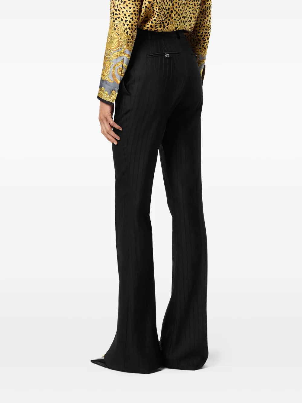 Versace Pinstripe-flared Trousers In Black