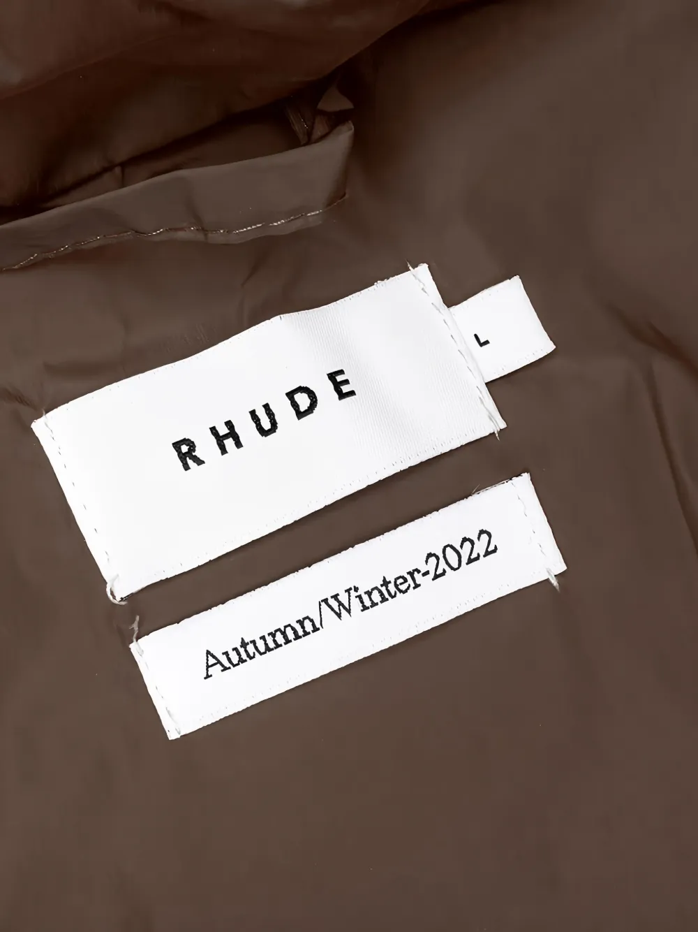 RHUDE Donsjack met logo Bruin