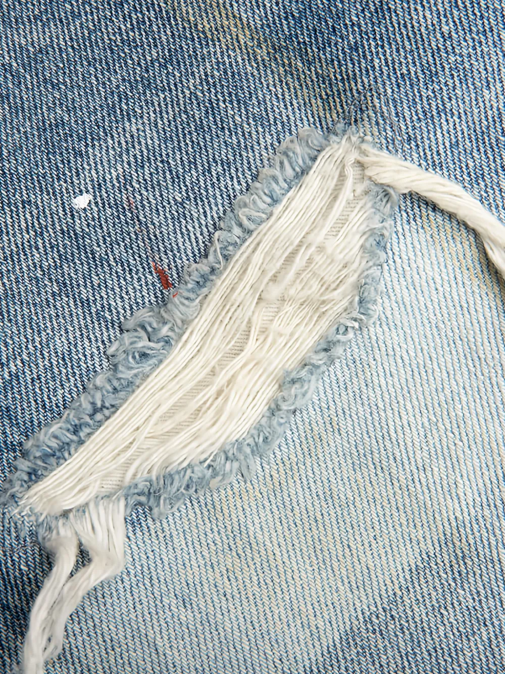John Elliott The Daze jeans met verfspatten en franje Blauw