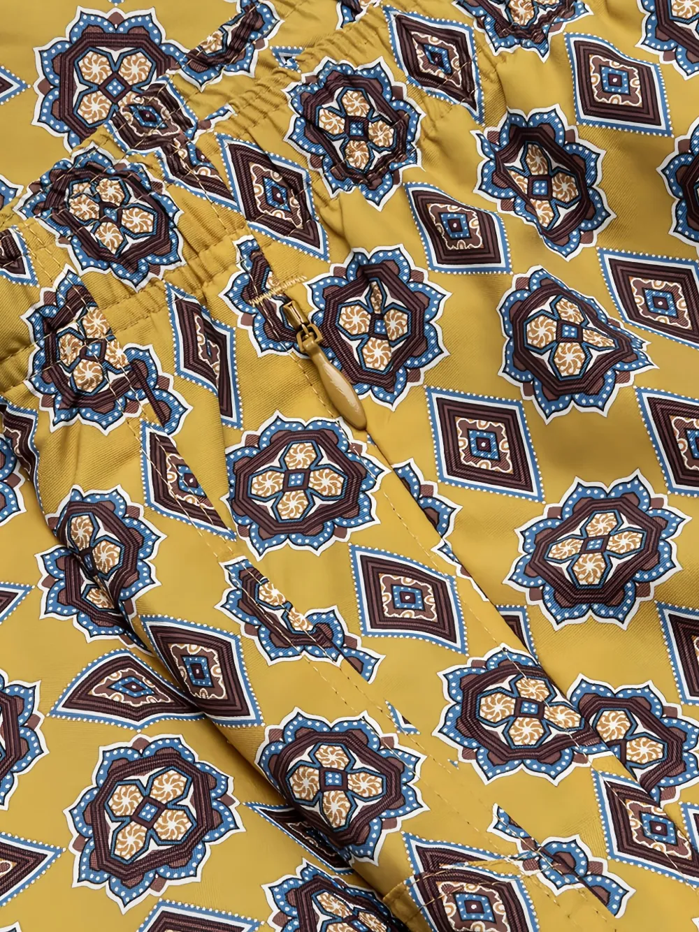 Needles patterned drawstring swim shorts Geel