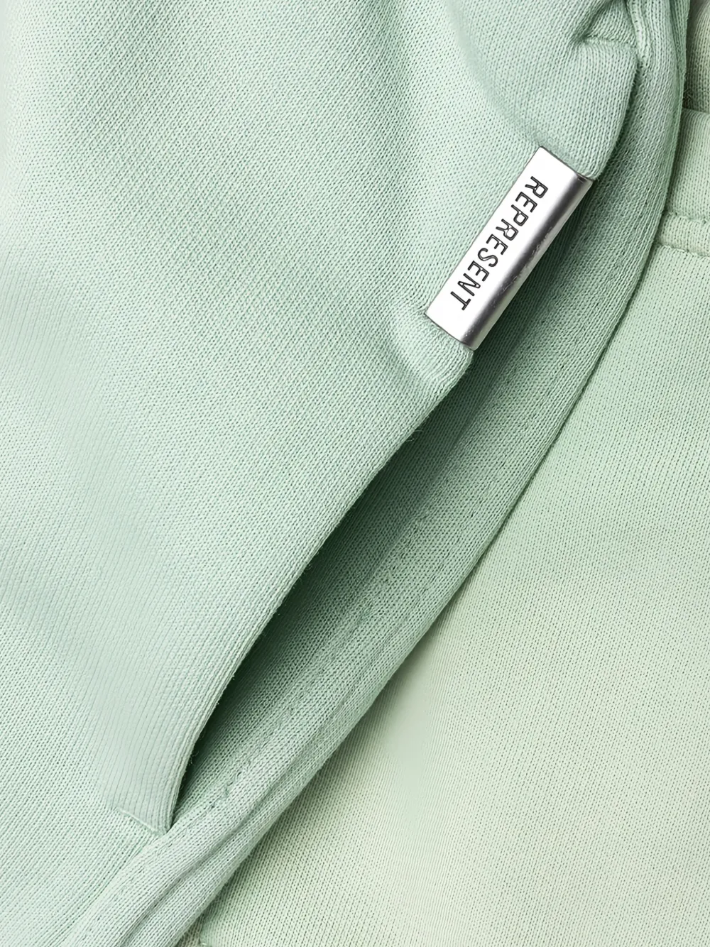 Represent Shorts met geborduurd logo en zak Groen