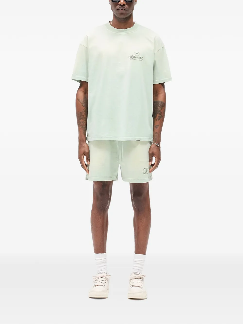 Represent Shorts met geborduurd logo en zak Groen
