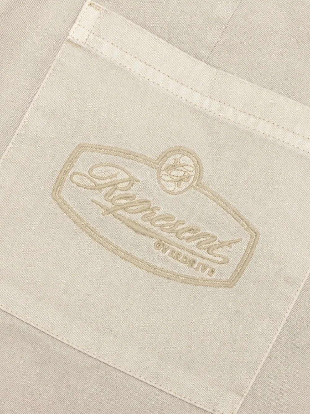 Represent Shorts met geborduurd logo Beige