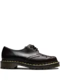 Dr. Martens perforated leather boots - Brown