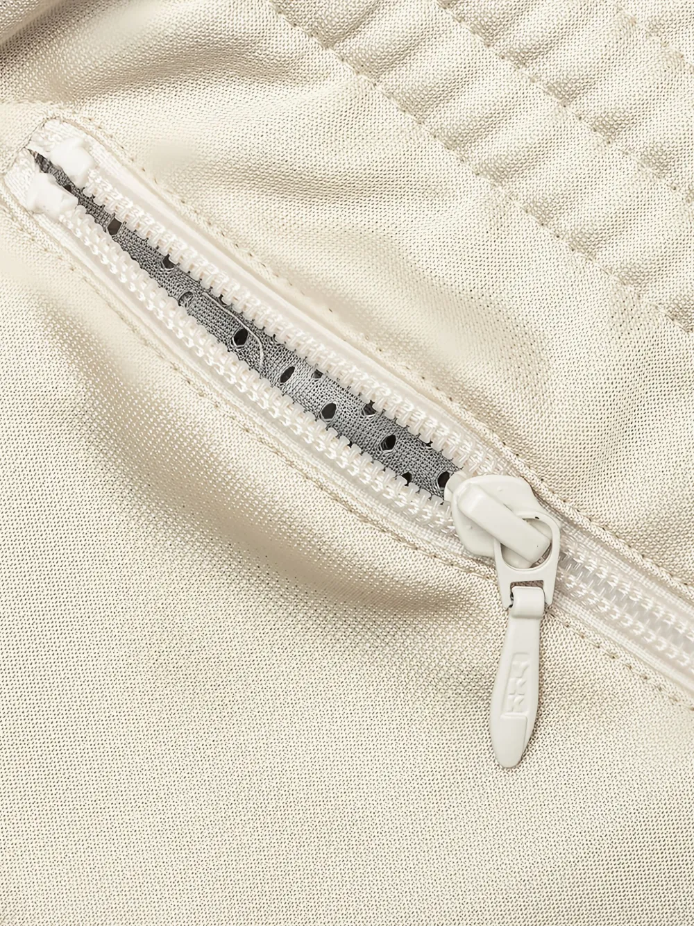 Needles Broek met geborduurd logo Beige