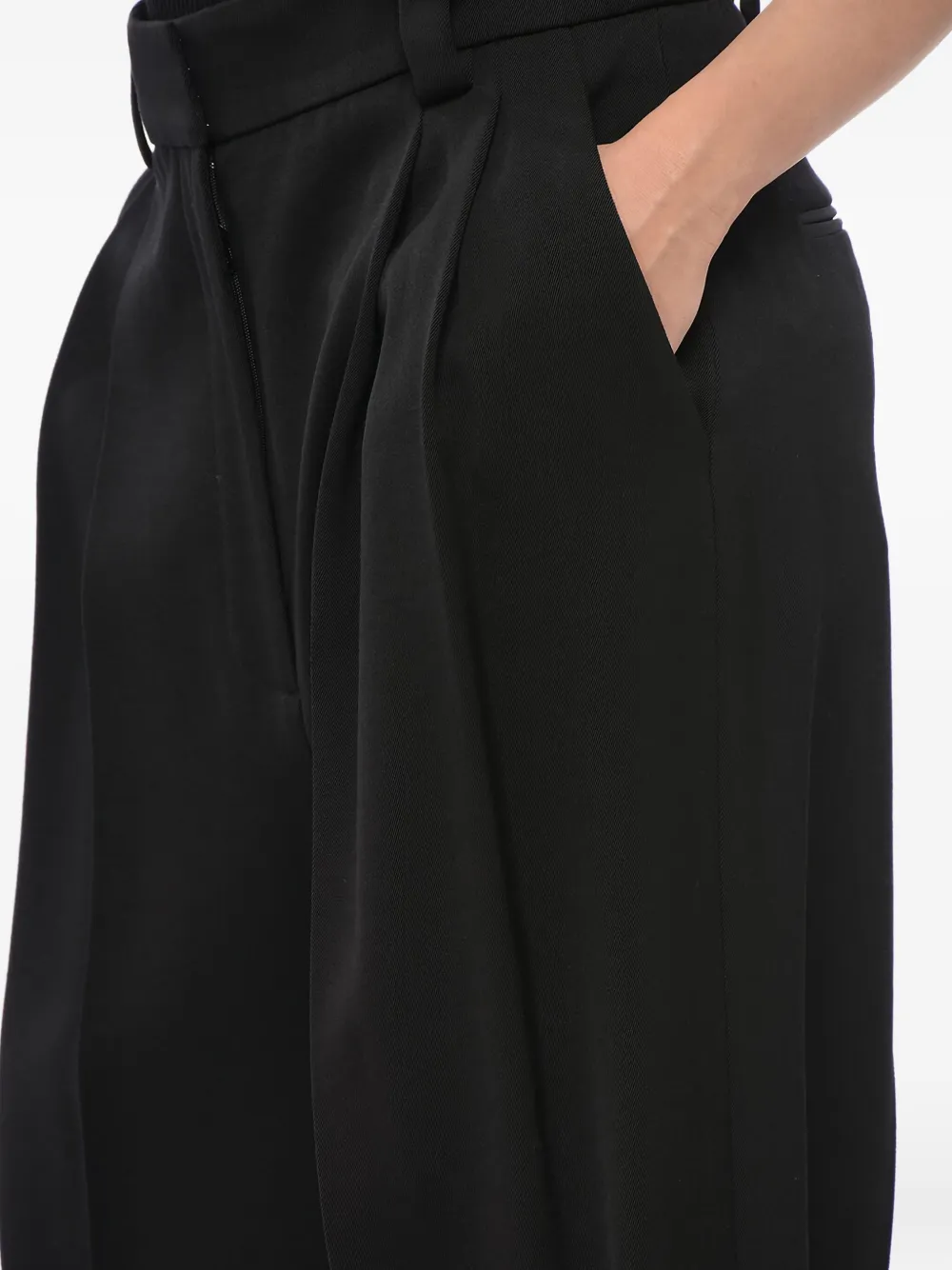 KHAITE pleated palazzo trousers Zwart