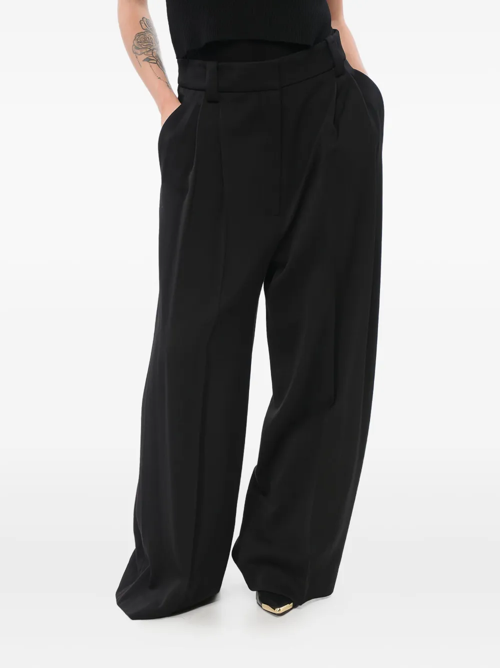 KHAITE pleated palazzo trousers Zwart