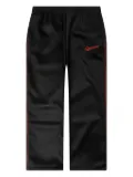 Willy Chavarria Ruff Rider side-stripe trousers - Black