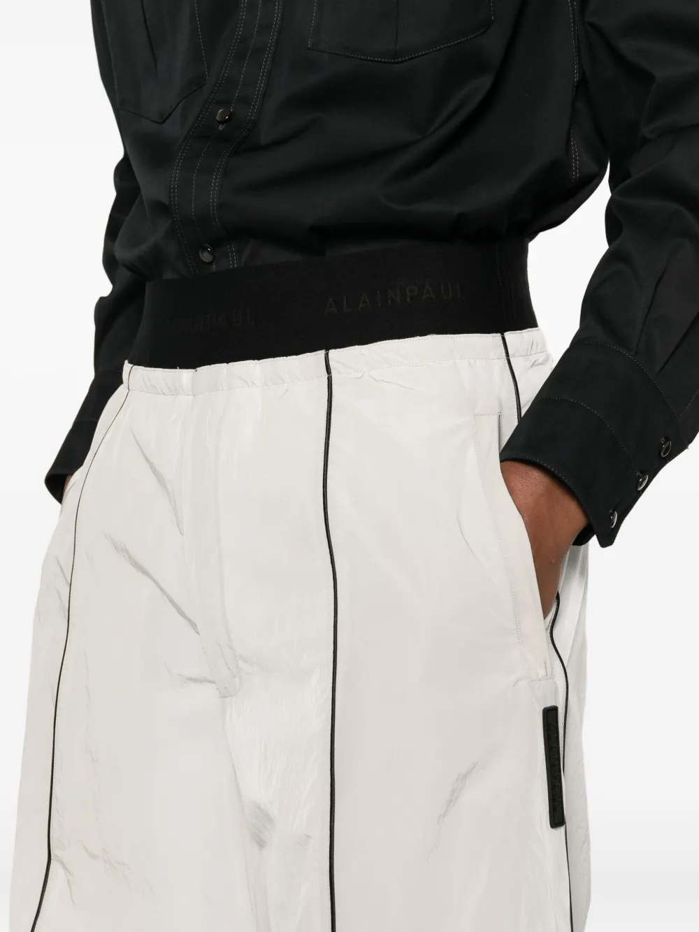 Alainpaul Piping Track Pants In White