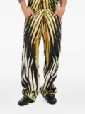 Roberto Cavalli flame-print trousers - Black