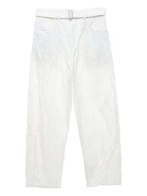 Studio Nicholson jeans med krøllet effekt og bælte