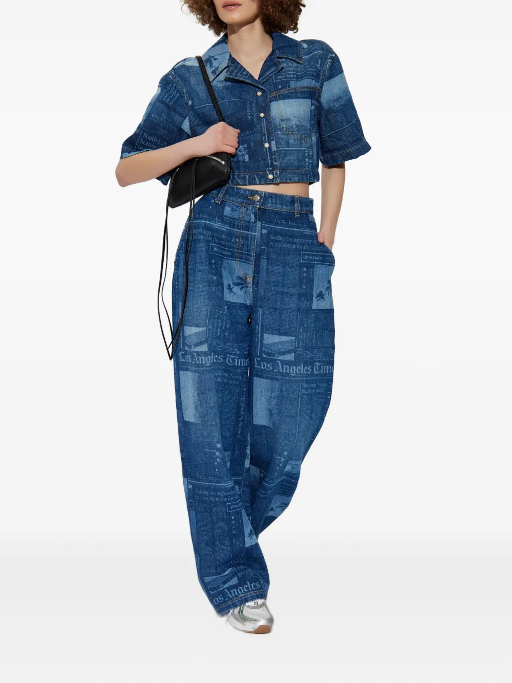Palm Angels newspaper-print cotton jeans Blauw