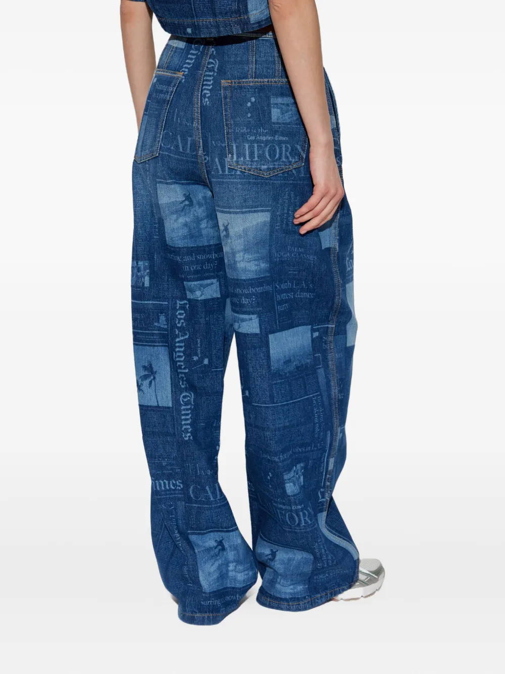 Palm Angels newspaper-print cotton jeans Blauw