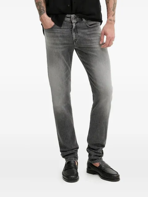 Diesel back-patch faded jeans