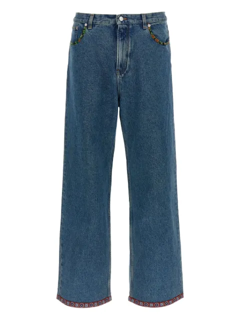 Valentino Garavani floral-insert jeans